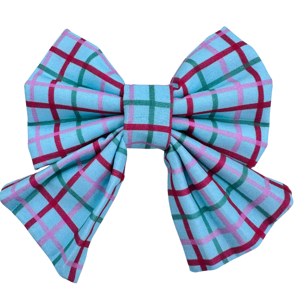 Plaid patterned bow on a white background